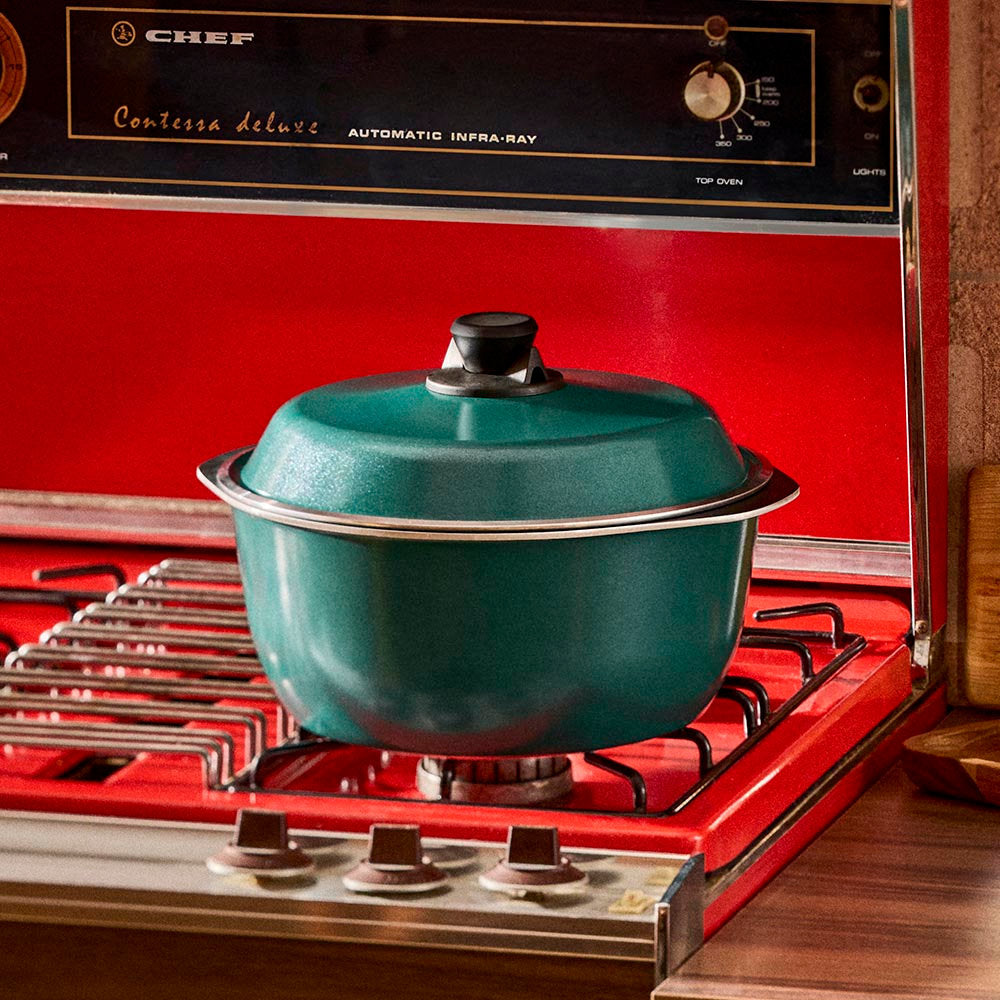 Turquoise pot on a red vintage stove